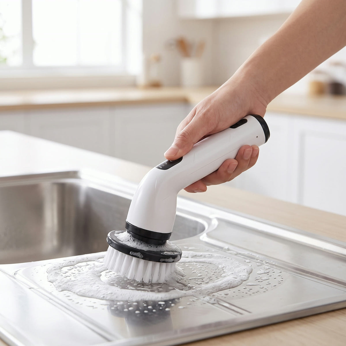Cleaning a kitchen sink with the compact handheld mode