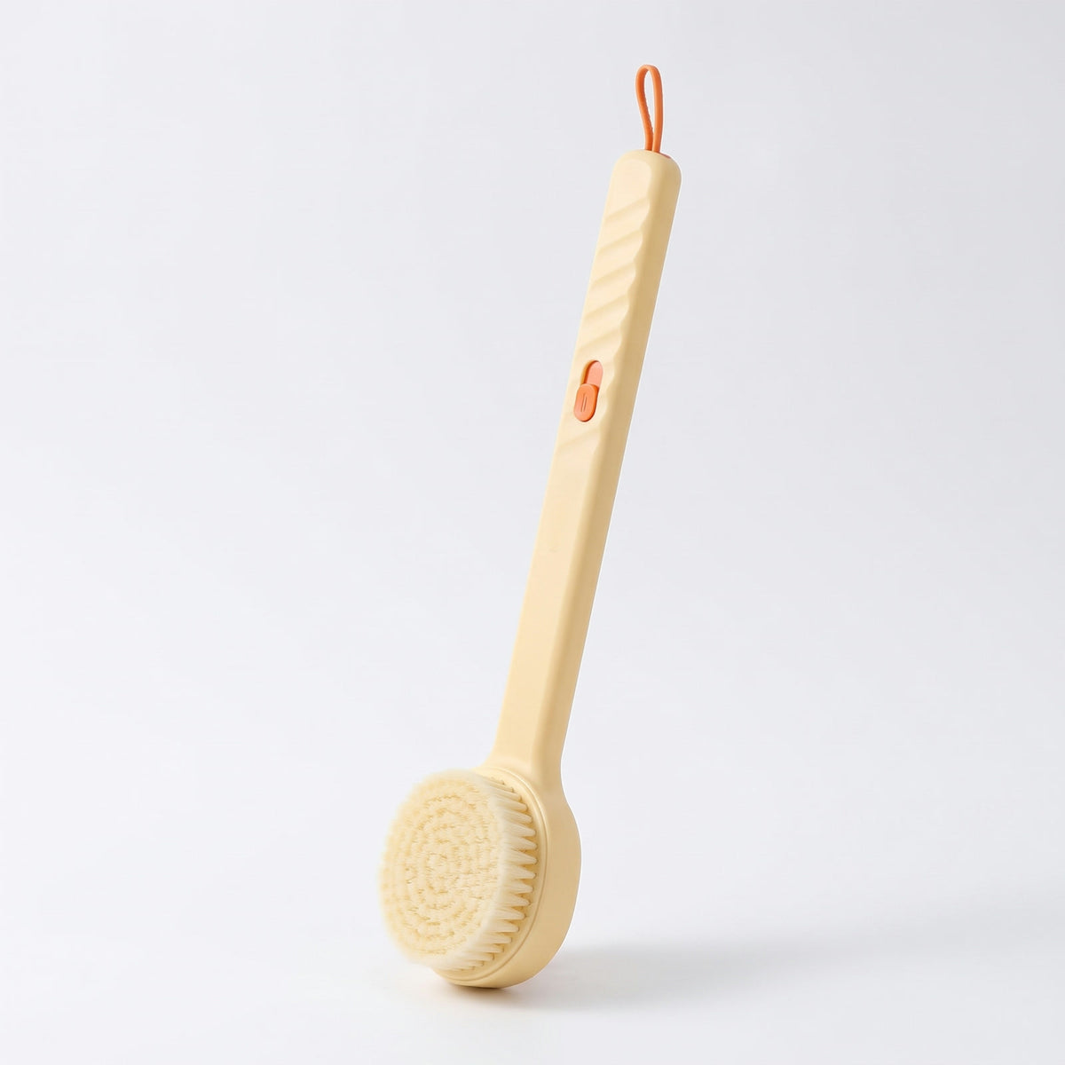 Lather Reach Back Brush in Butter Yellow on a white background