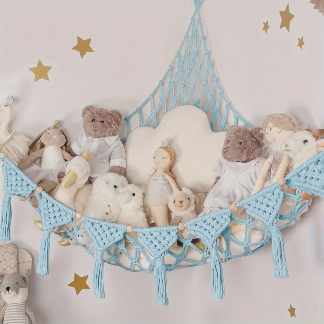 Macrame Stuffed Animal Hammock: a hand drops a teddy bear into the hammock, then the black and grey hammocks full of plush toys and a nursery corner