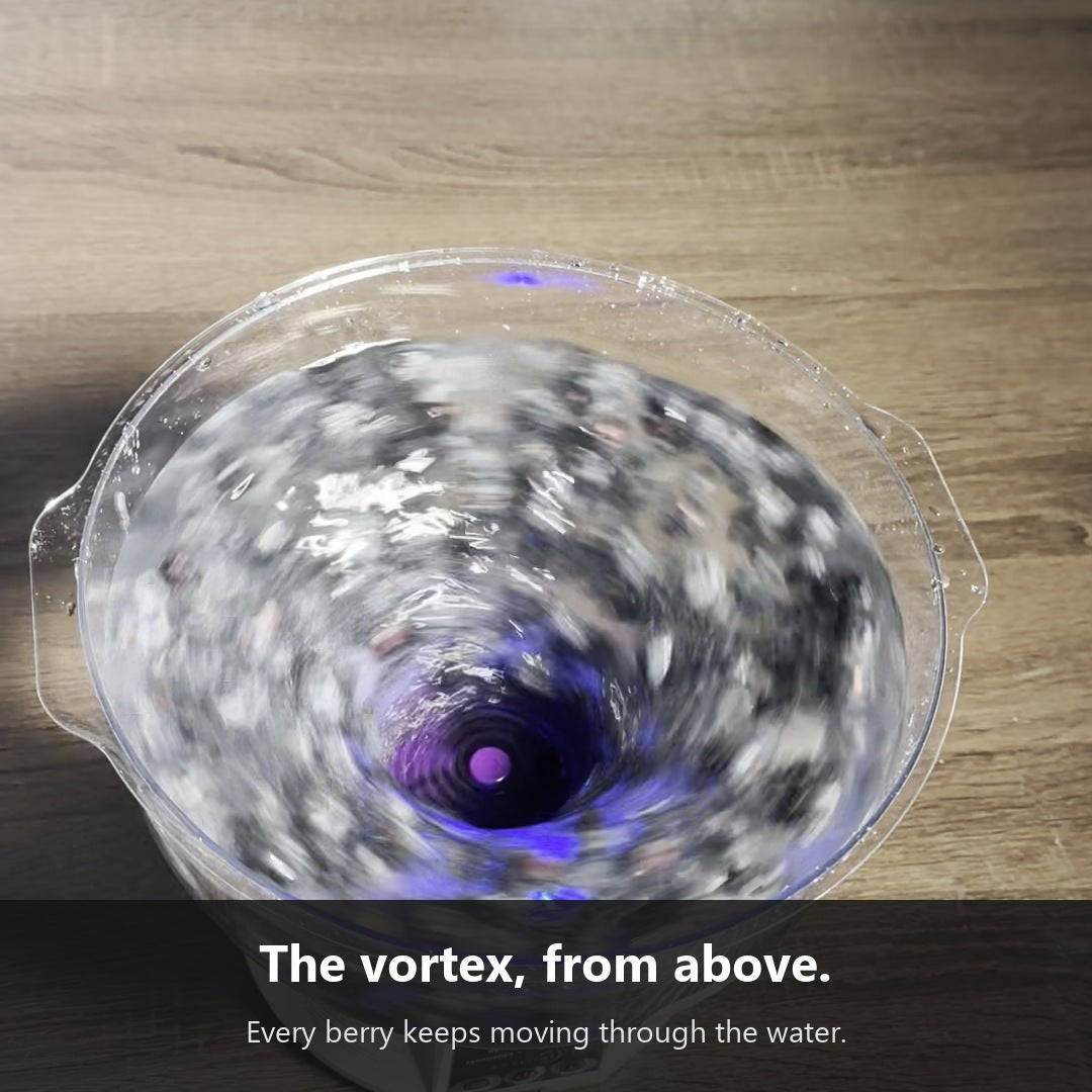 The Vortex Produce Washer vortex from above, blueberries circling through the water