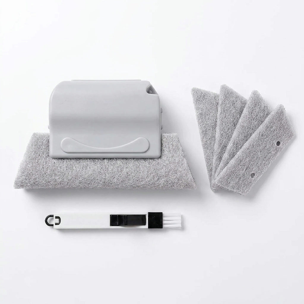 Grey window track cleaner set with spare fiber pads and corner wand on white background